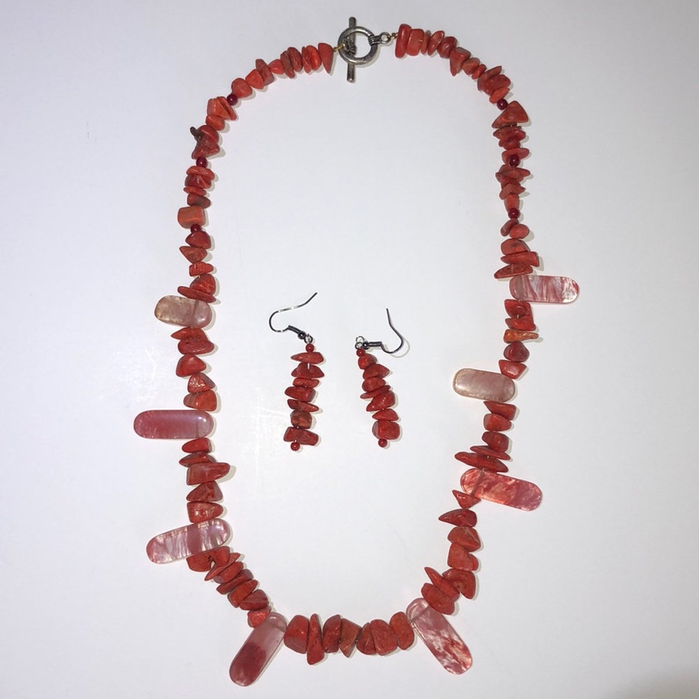 Coral necklace with matching earrings.